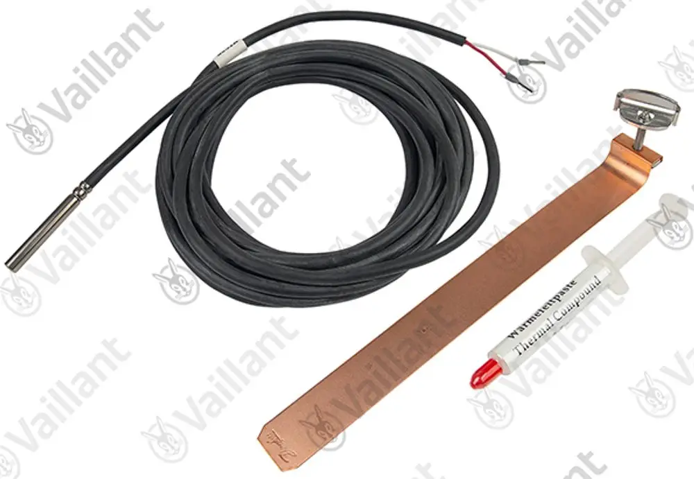 Sensor mit einem Metallfühler, Kabeln und einer Kupferplatte, begleitet von einer Tube Wärmeleitpaste, präsentiert als Vaillant Produkt.